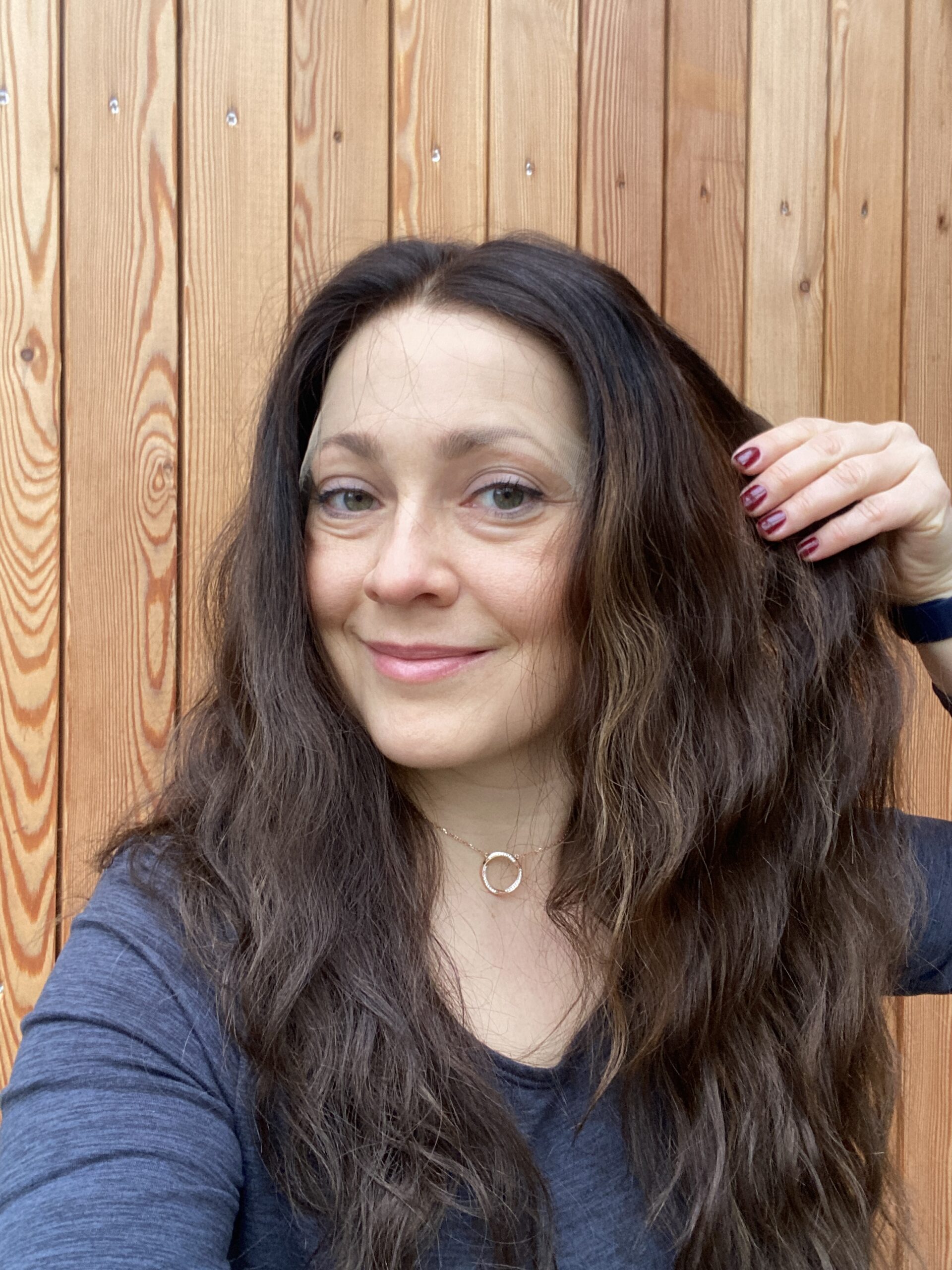 wavy dark brown wig with highlights and balayage